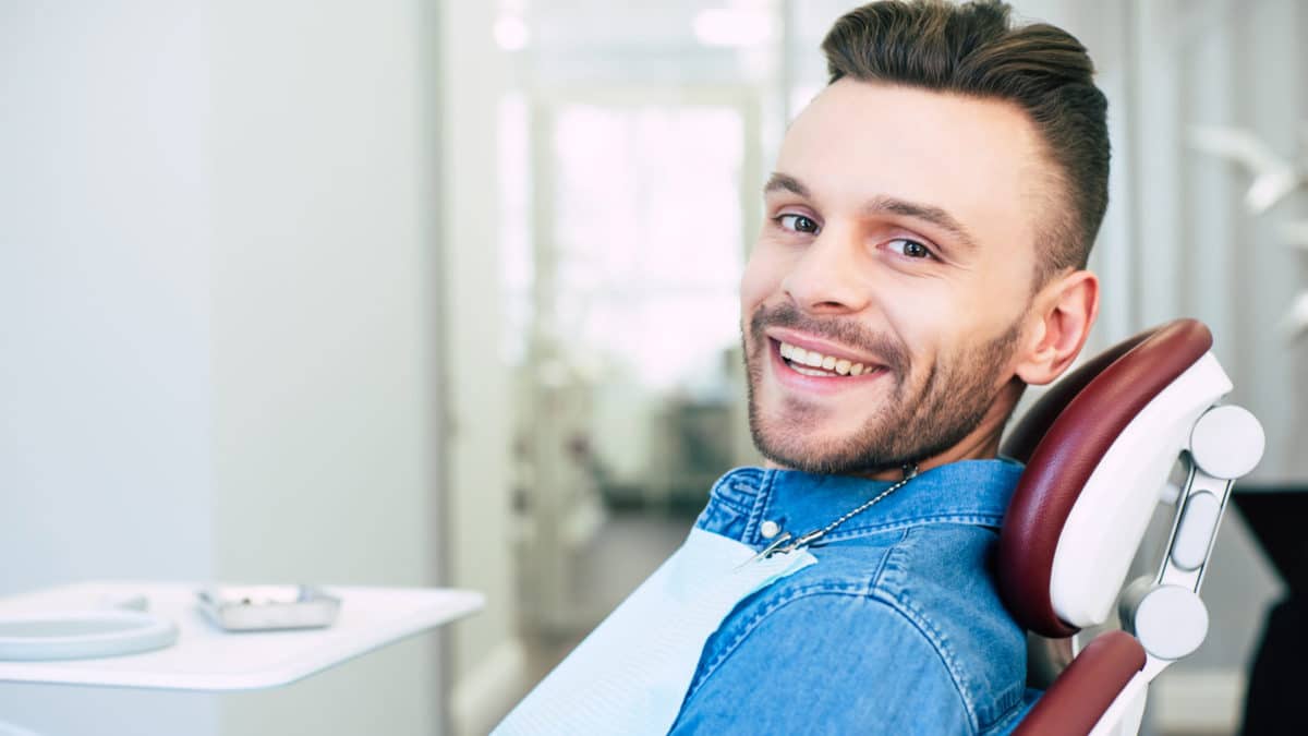 Tooth extraction patient at dentist in Washington MI