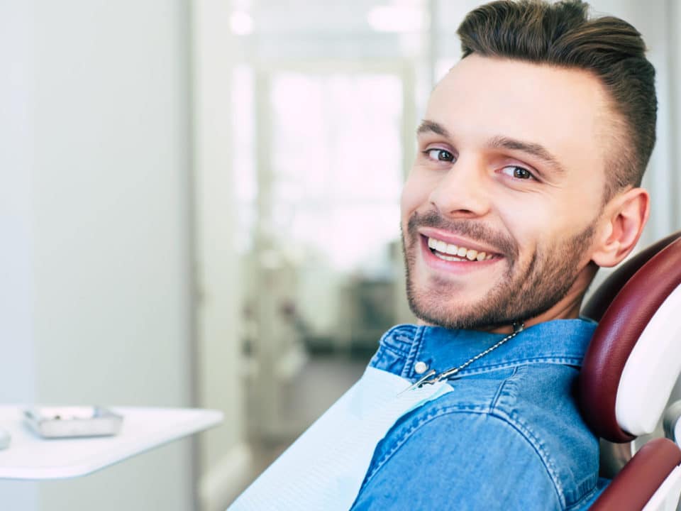 Tooth extraction patient at dentist in Washington MI