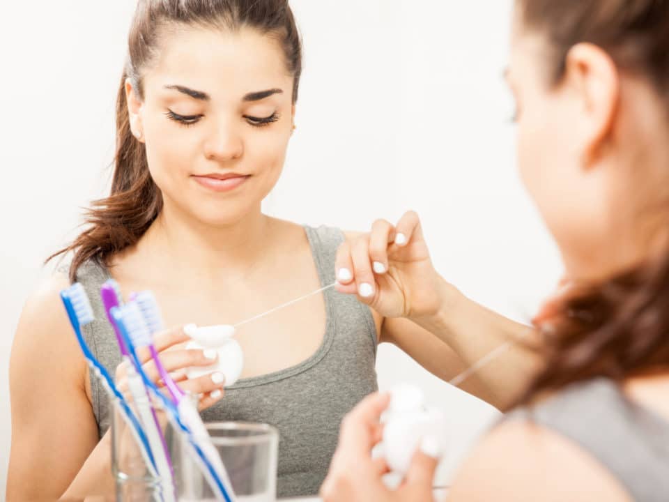 Flossing teeth Washington MI family dentist